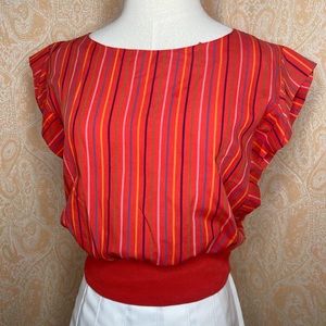 Vintage dolman ruffle sleeve top with elastic waist.